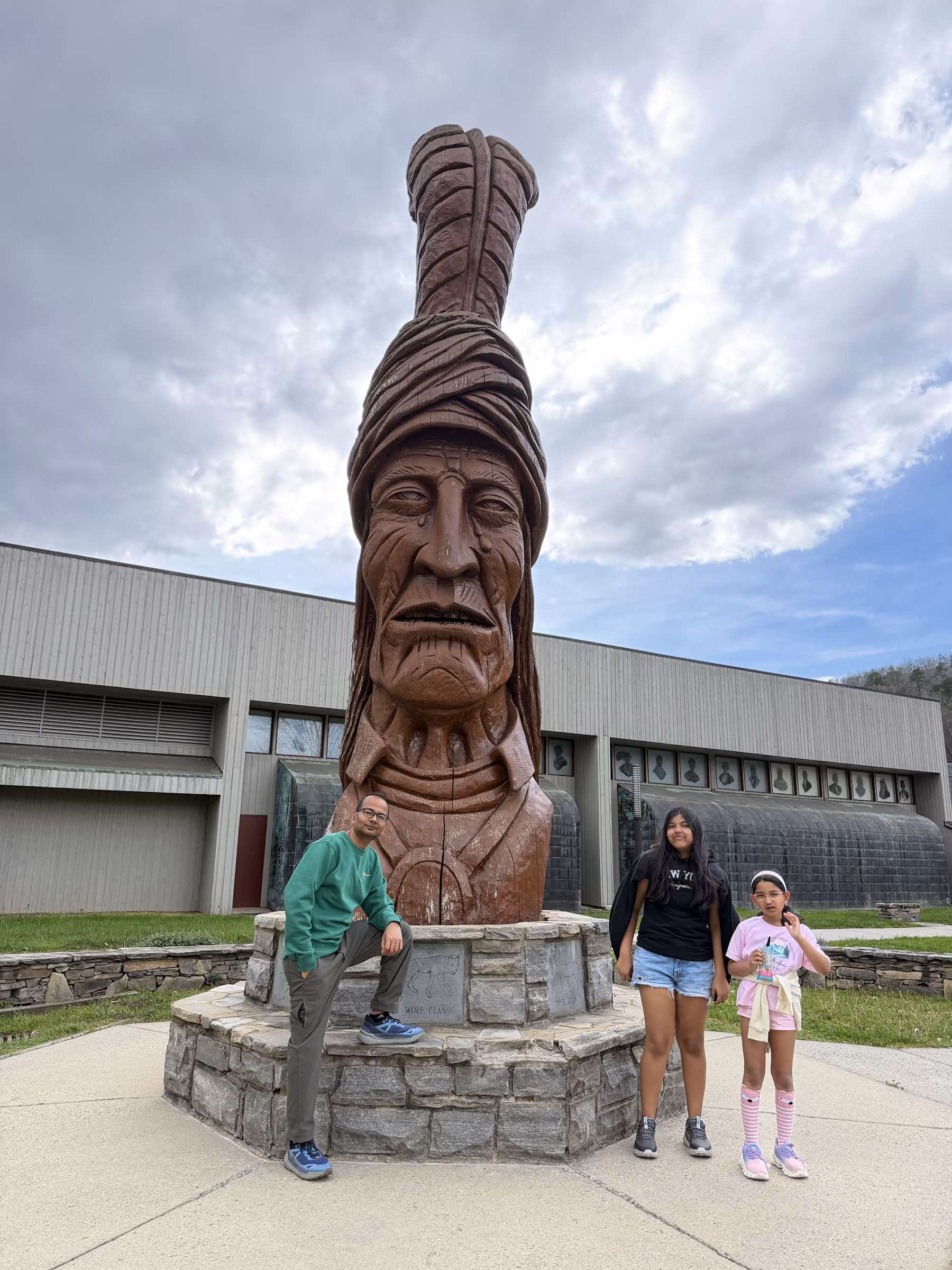 Large carved face and Cherokee town scene on the North Carolina side of the Smokies