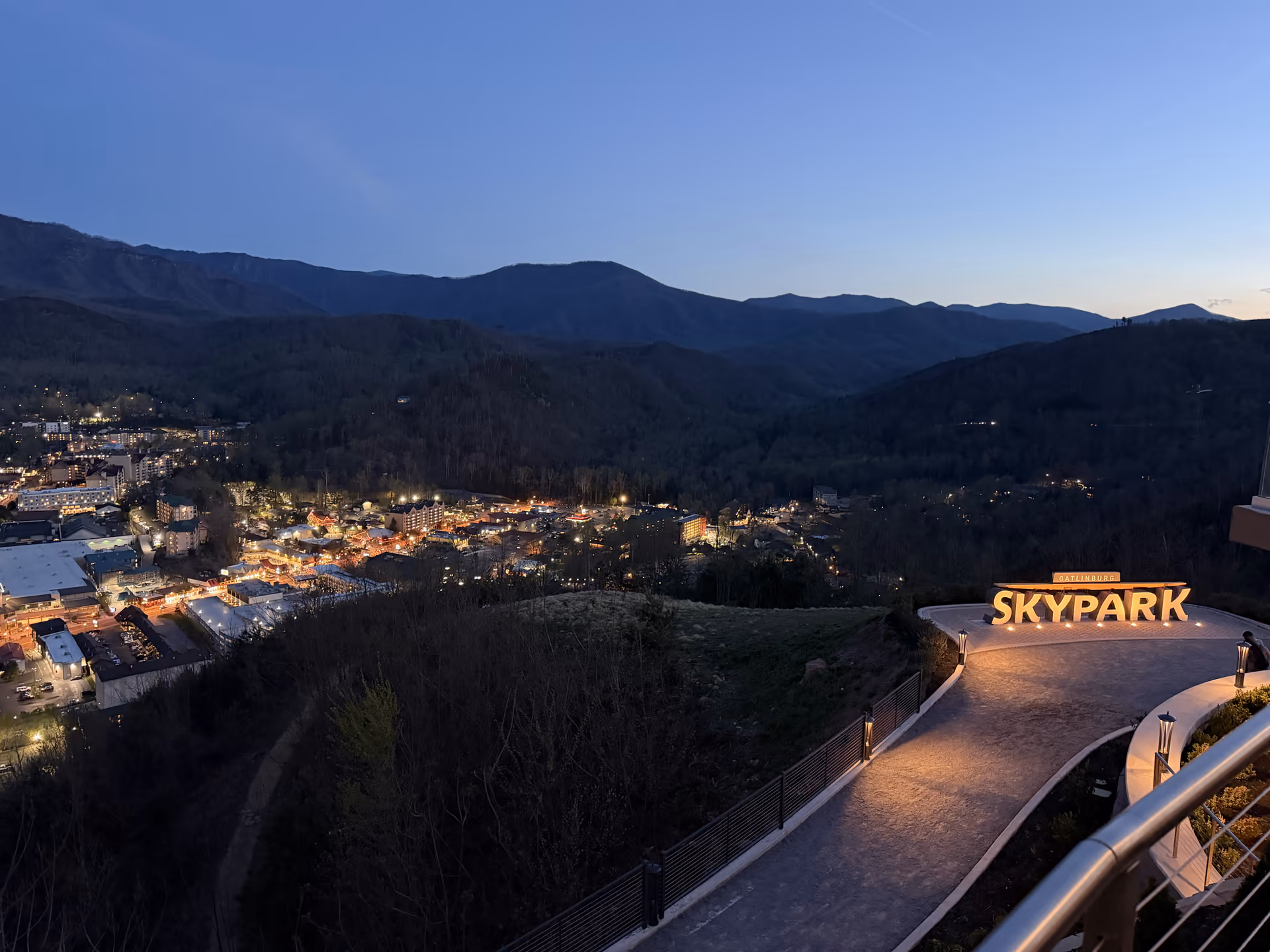 Gatlinburg SkyPark overlook at blue hour with town lights below