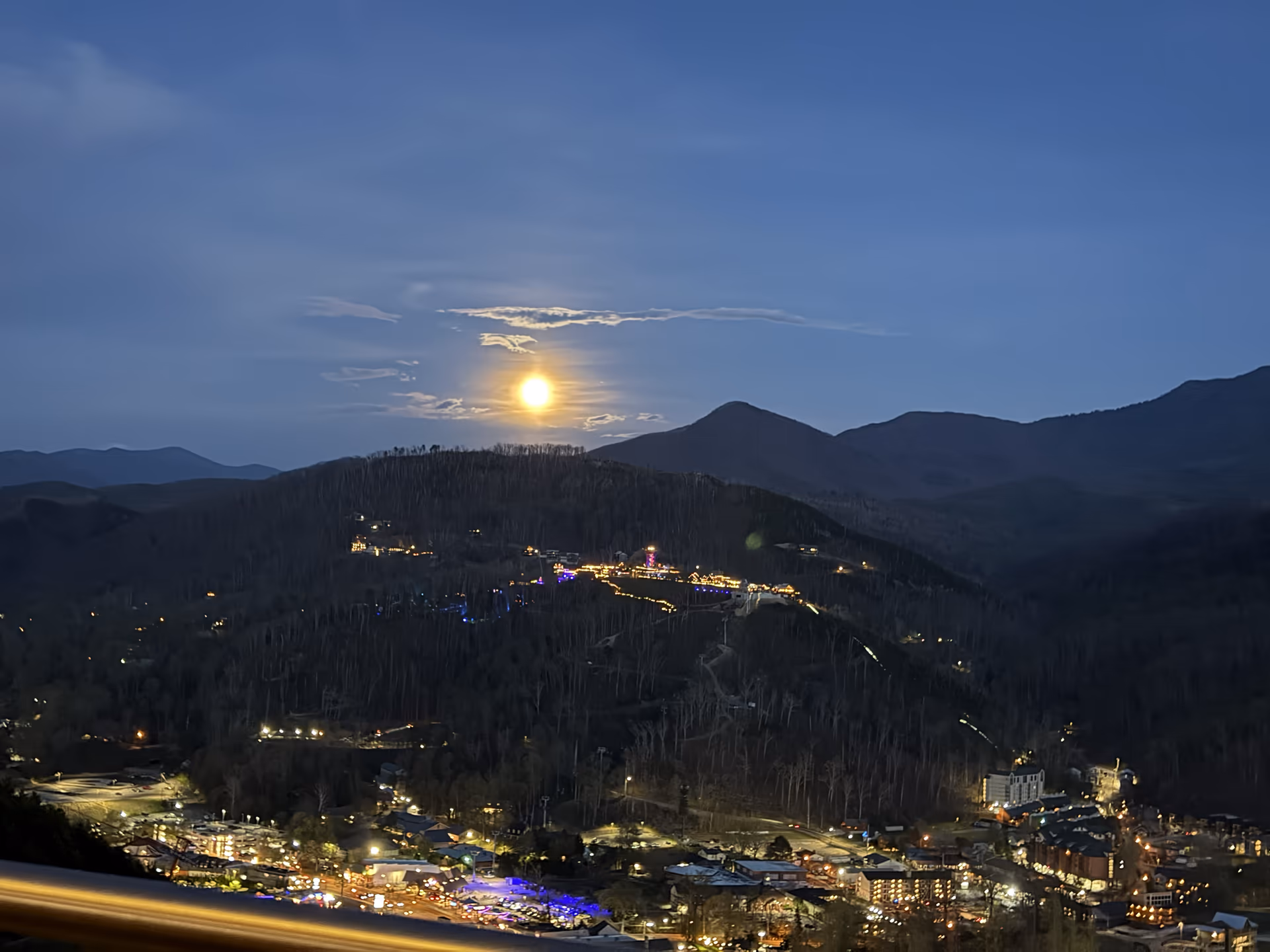 Full moon over the mountains and Gatlinburg lights from Gatlinburg SkyPark
