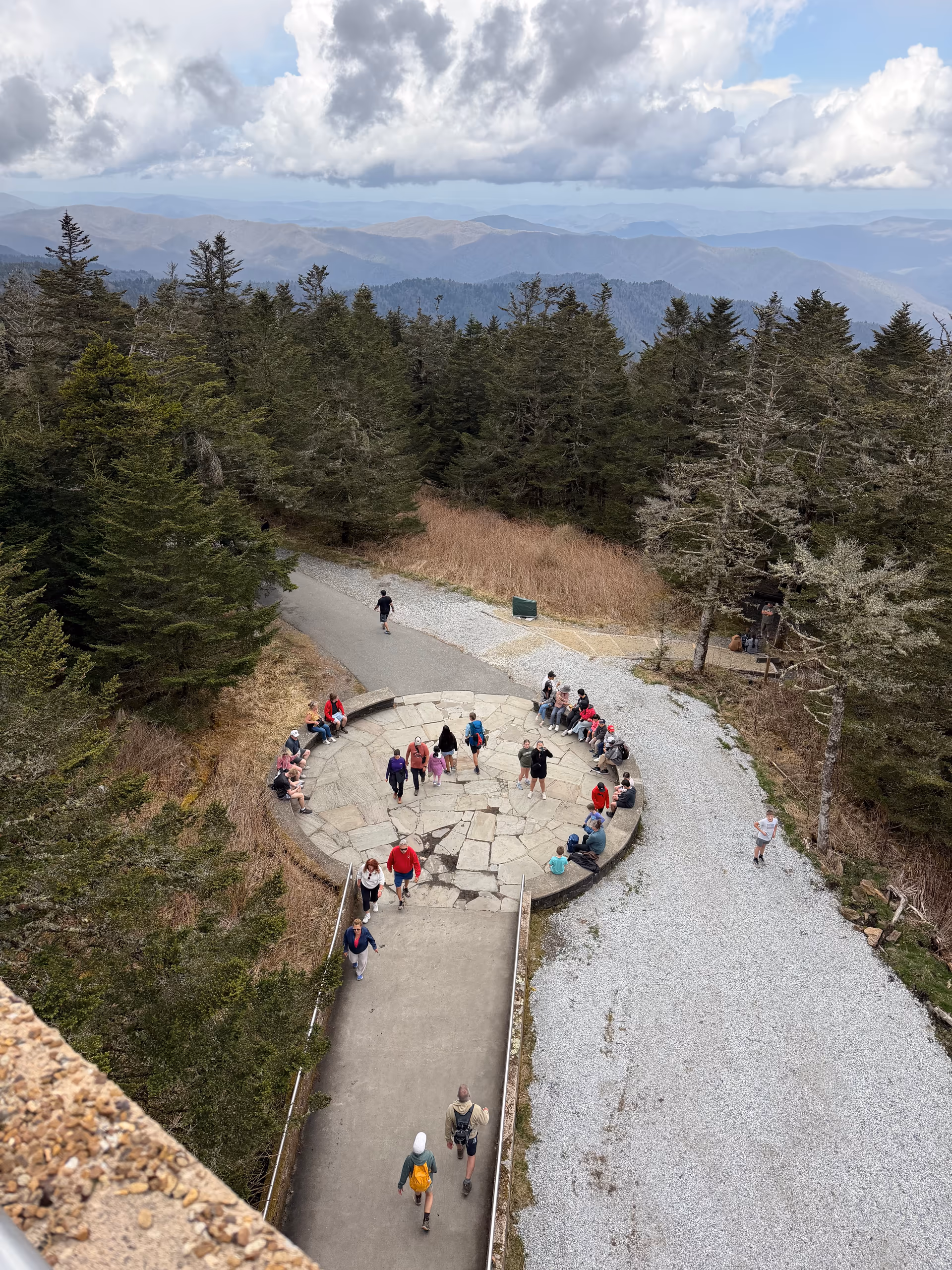 Visitors gathered around the Kuwohi observation tower platform