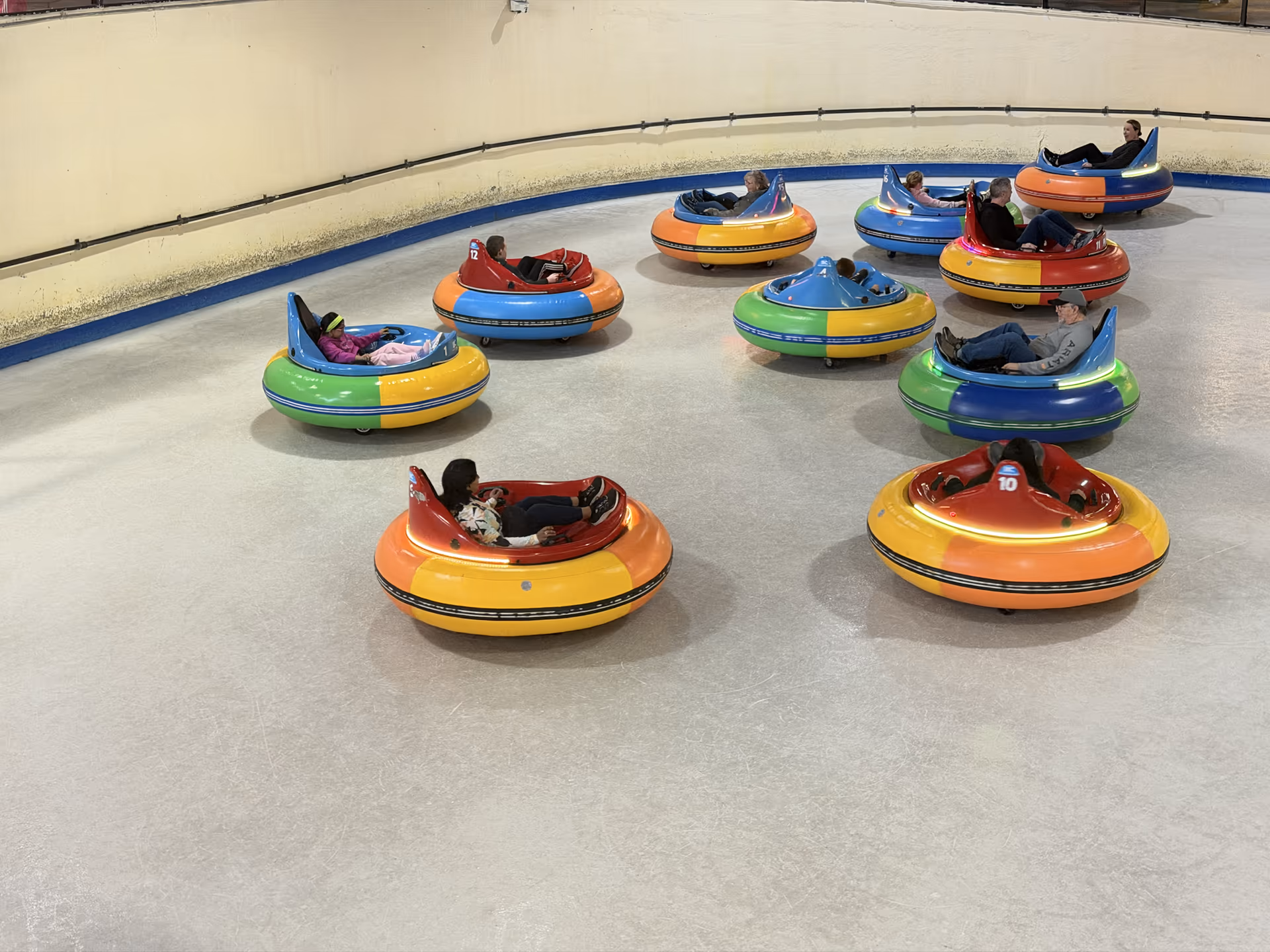 Colorful ice bumper cars on the rink at Ober Mountain